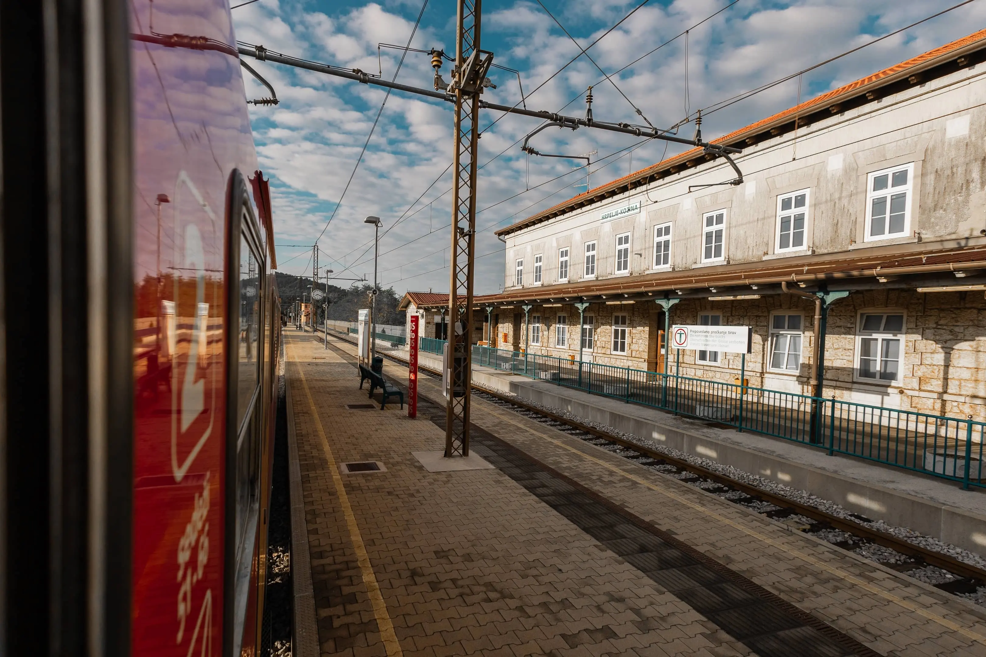A train pulls into a European train station