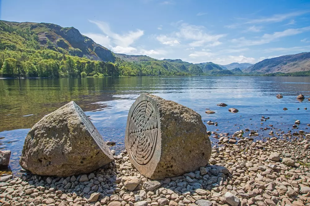 Lake view with a rock that has a special carving