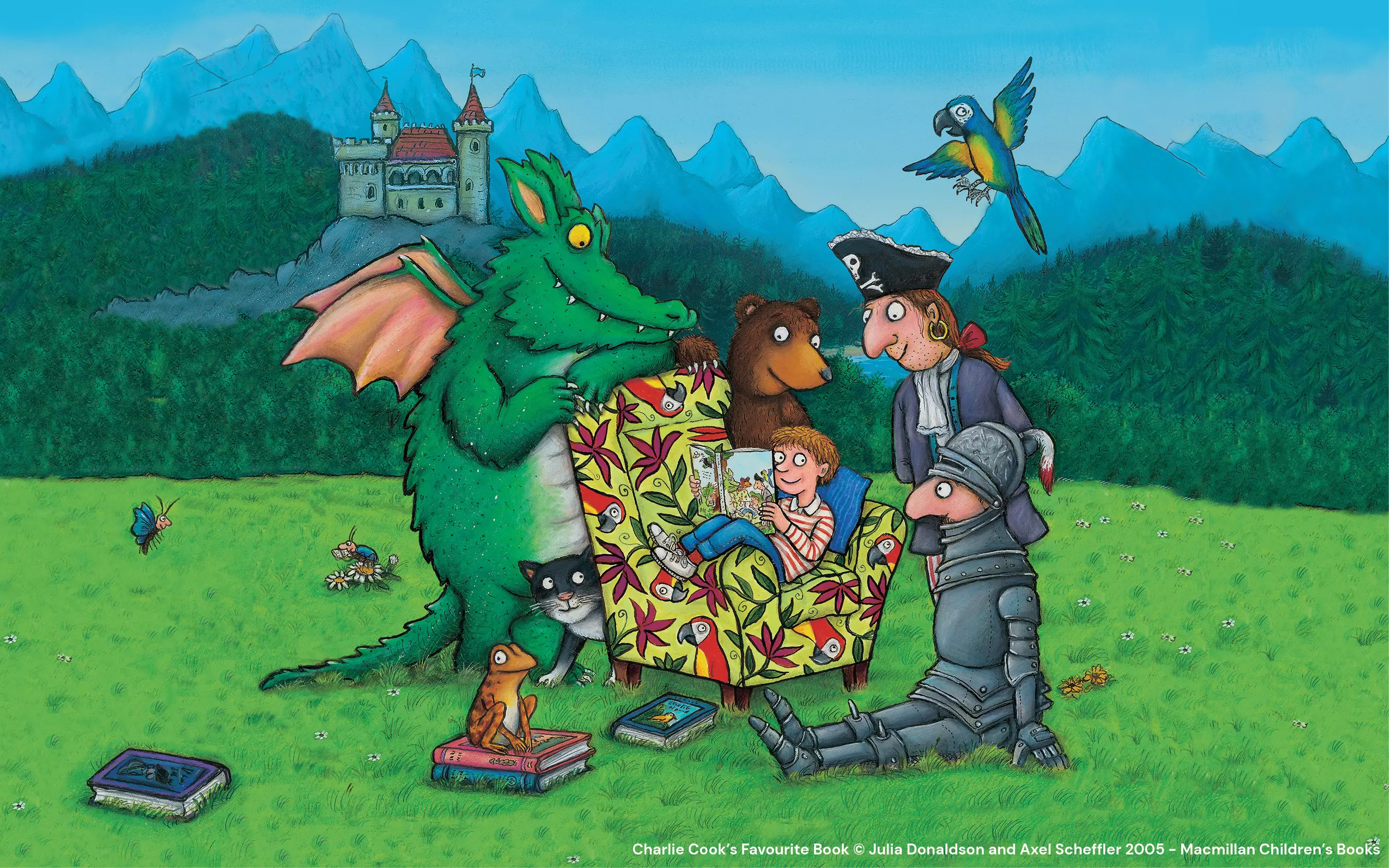 A cartoon dragon, bear, pirate and knight surround a boy sitting in an armchair reading a book. In the background there is a castle and mountains.