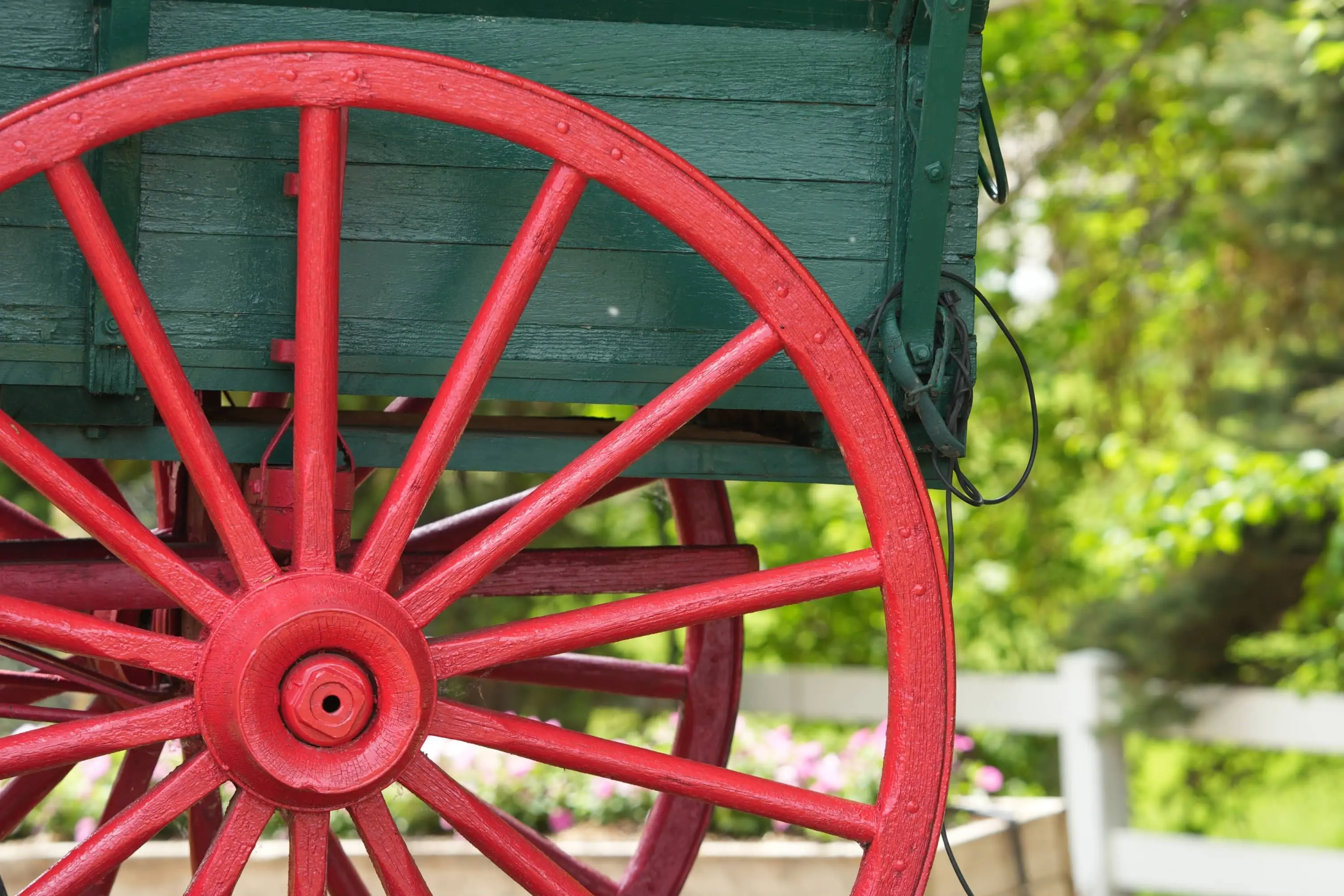 Stockton and Darlington Railway: A close-up of a bright red wheel of a horse-drawn wagon