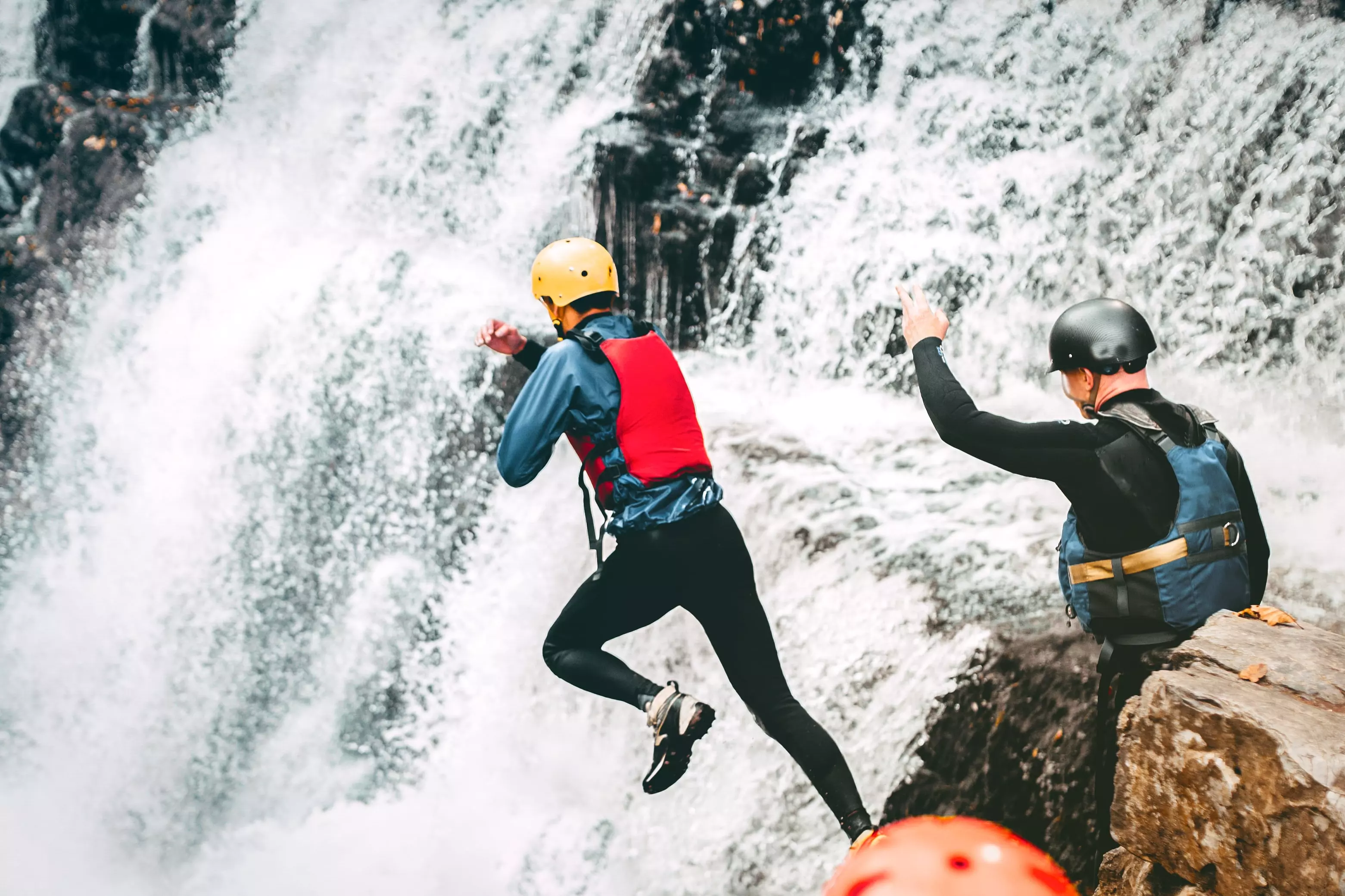 Coasteering - cliff, waterfall jumping in Brecon Beacons.