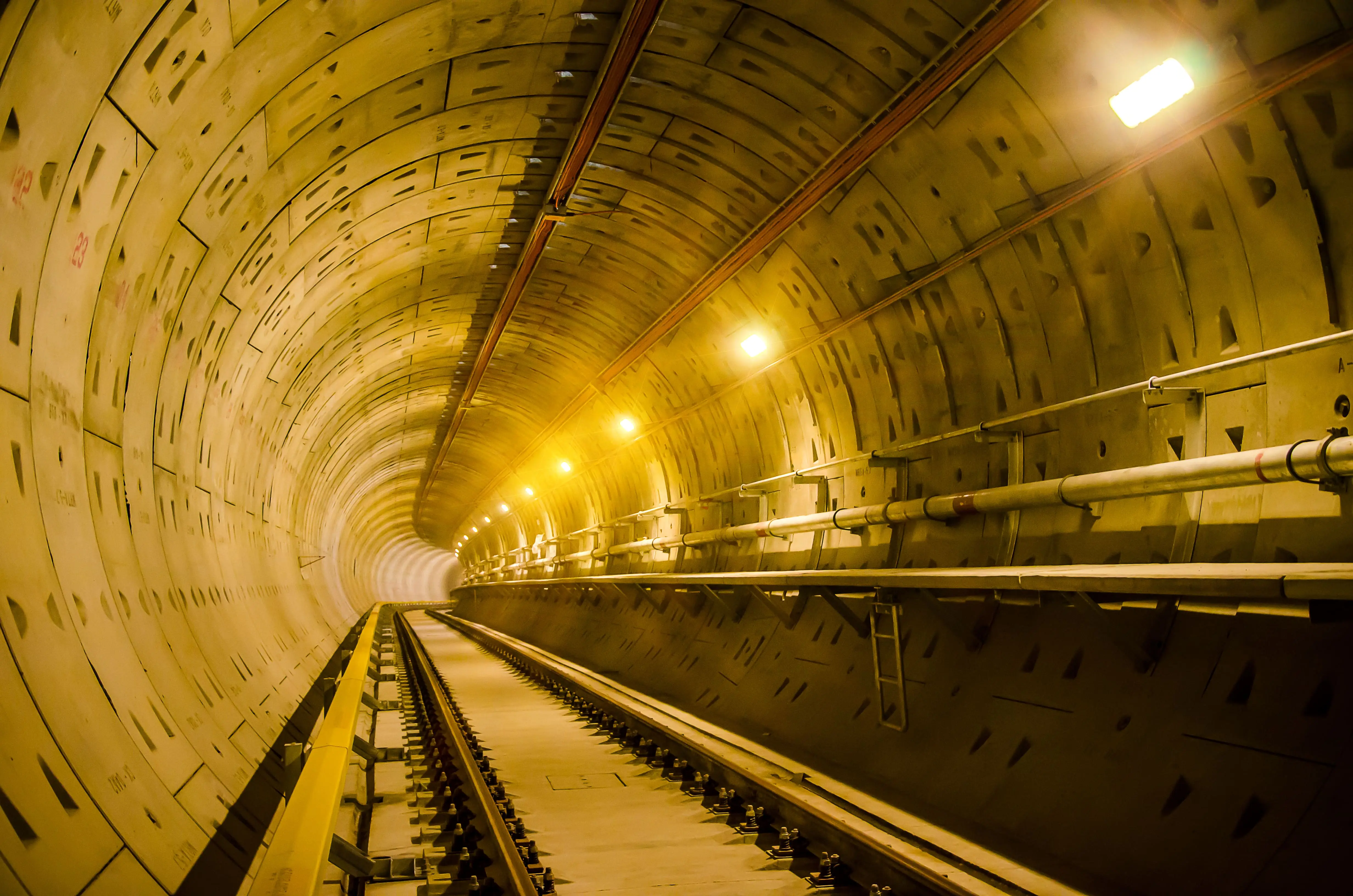 A shot of the Channel Tunnel mid-journey, well-lit and underground.